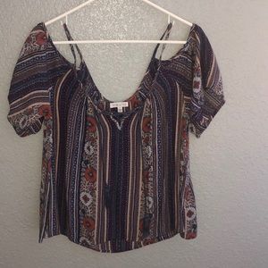 A colorful off the shoulder sleeve blouse